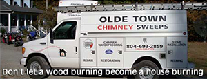 Olde Town Chimney Sweeps work truck text says Don't let a wood burning become a house burning